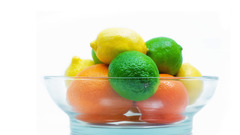 Fruits limes oranges bowls