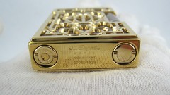 Gold Paris white background lighters St. Dupont