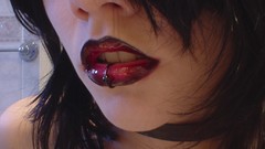 Gothic woman lips pierced lips