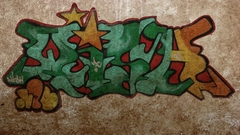 Grafitti stucco cement why?