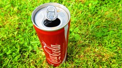 Grass coca-cola coke soda cans