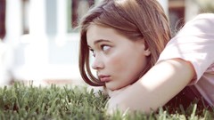 Grass woman brunettes lying down teen scott looking away