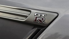 Gray cars close-up side view vehicles logos nissan gt-r emblems 