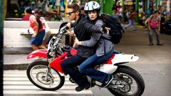 Guns helmets streets rachel weisz jeremy renner motorbikes The 
