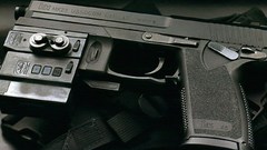 Handguns SOCOM MK23 45