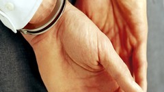 Hands handcuffs hands behind