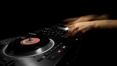 Hands vinyl DJ black background scratch move mixboard