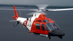 Helicopters coast guard vehicles