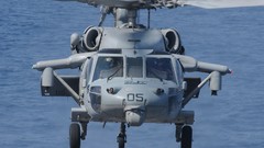Helicopters hover US Navy MH-60S Knighthawk