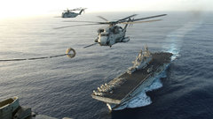 Helicopters vehicles aircraft carriers.
