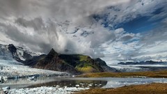Landscapes nature Mountains clouds lagoon glacier Skaftafell