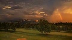 Landscapes nature Trees grass Mountains clouds rainbows Golf 