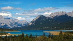 Landscapes nature Trees yellow water blue Mountains clouds 