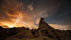 Landscapes Rays nature Stars clouds hills storm golden skies 