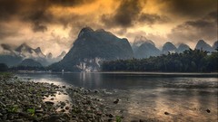 Landscapes sunset nature Trees water Mountains clouds palm 