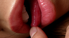 Lips licking tongue fingers