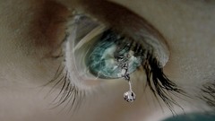 Macro eye eyelashes tears Frozen artwork dripping