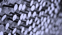 Macro metal monochrome bokeh nails (fastener)