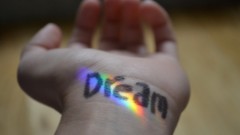 Macro rainbows hand sign