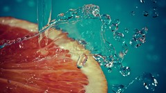 Macro water oranges splashes slow motion