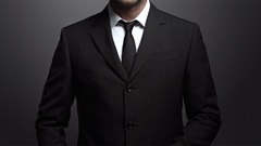 Men classic tie beard Gerard Butler suit Anonymous james bond