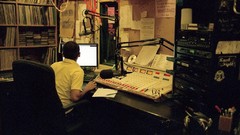 Men console speaker studio recording