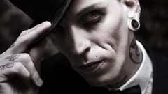 Men cylinder tattoos ear plugs