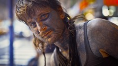 Men faces tattoos body painting homeless person
