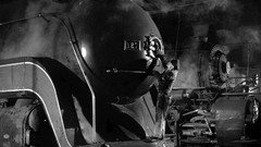 Men monochrome old photography steam locomotives repairing