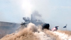 Military tanks dust Russians