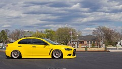 Mitsubishi Lancer Evo X Car yellow cars Mitsubishi vehicle