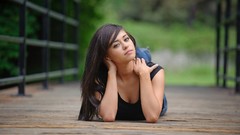 Models black dress cleavage takara Mike Reid