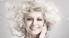 Models smiling curly hair