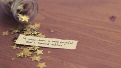 motivational wooden surface glass paper