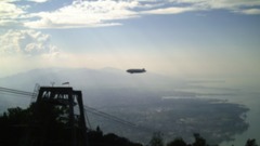 Mountains ocean clouds blurry