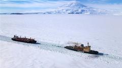 Mountains ships vehicles Antarctica