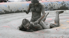 Mud wrestling couple funny