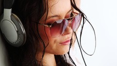 Music white woman headphones dancing sunglasses Mayra Munoz