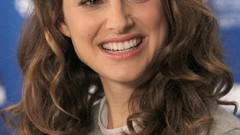 Natalie Portman smiling gray