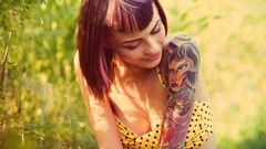 Nature woman tattoos smiling piercings cleavage Kara McGnarley