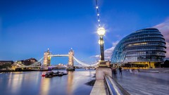 Night water clouds lights London Boats Tower Bridge buildings 