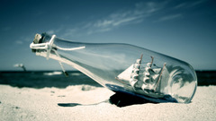 Ocean sand bottles ships
