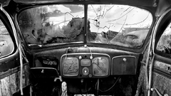 Old monochrome abandoned car