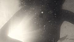 Particles woman underwater silhouettes