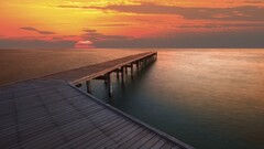 pier Sea sunset sky water clouds sunlight Wood jetty outdoors