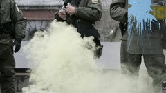 Police duel protest gas