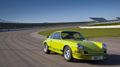 Porsche cars driving race