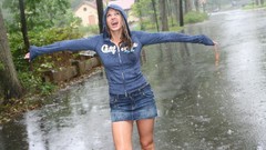 Rain wet models caught Ann Angel in the rain