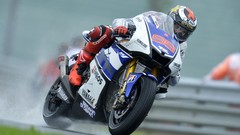 Rain wet Yamaha grand prix moto gp motorbikes Jorge Lorenzo 