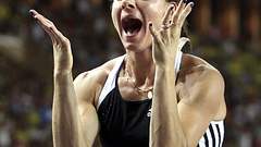 Reacts after breaking her